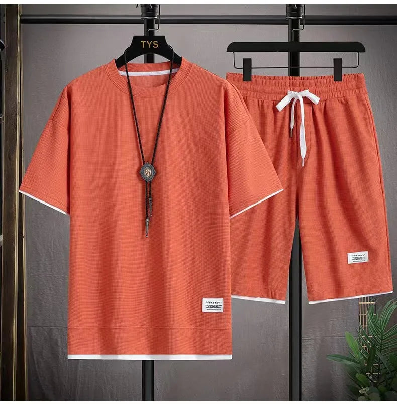 Men's quick-dry summer running set by THRIXINE, includes breathable shirt and shorts designed for active outdoor workouts.