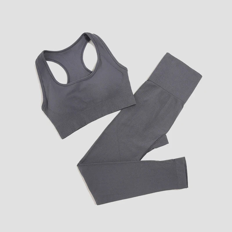 Seamless women's yoga set by THRIXINE, including a fitted sports bra and high-waisted leggings, perfect for activewear.