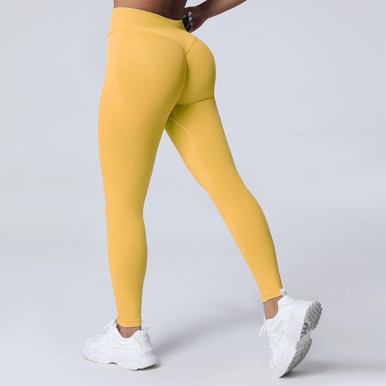 Women's low waist scrunch bum yoga leggings by THRIXINE, featuring a stretchy fit and flattering design for active wear.
