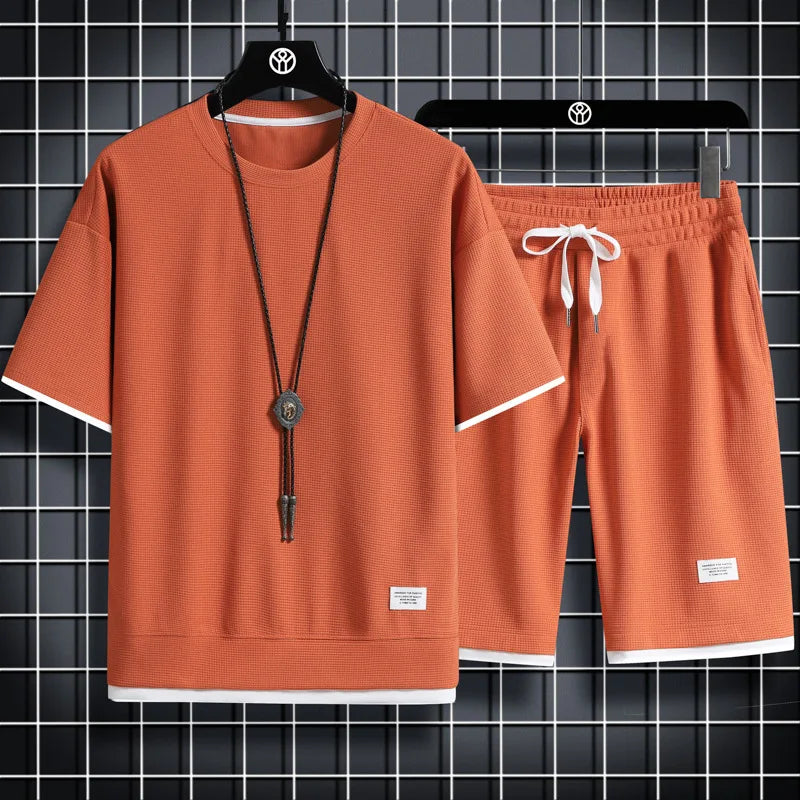 Men's quick-dry summer running set by THRIXINE, includes lightweight performance shirt and shorts for active outdoor exercise.
