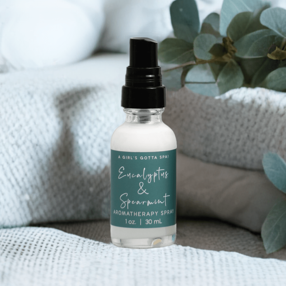 Eucalyptus and spearmint aromatherapy spray by A Girl's Gotta Spa! with a spray nozzle and fresh scent description.