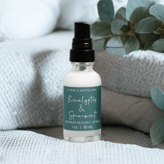 Eucalyptus and spearmint aromatherapy spray by A Girl's Gotta Spa! with a spray nozzle and fresh scent description.