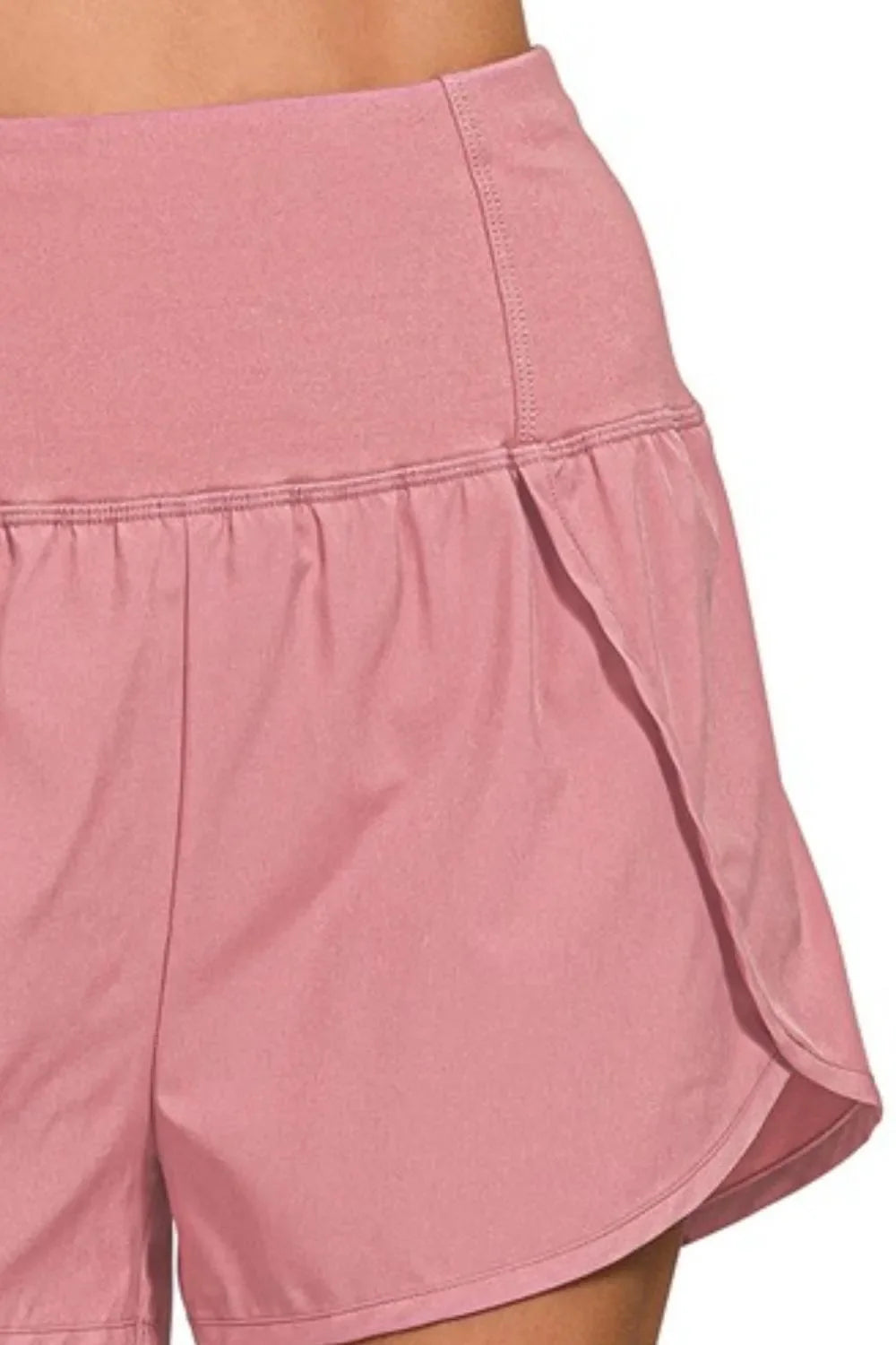 Berry Charmz Zenana high-waisted zippered running shorts with back pockets, designed for active wear and comfort.