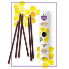 Elderberry infused honey in a jar with a honey dipper, showcasing the All Things Elderberry brand and natural elderberry flavor.
