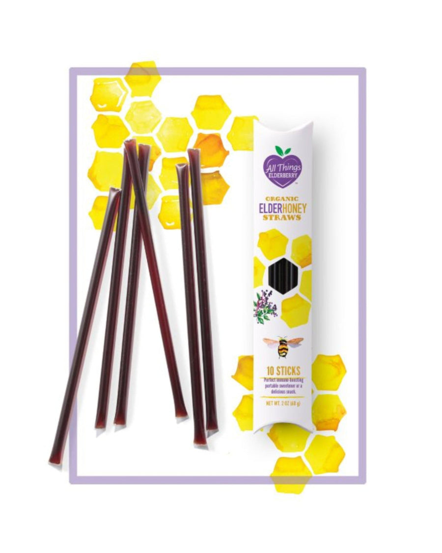 Elderberry infused honey in a jar with a honey dipper, showcasing the All Things Elderberry brand and natural elderberry flavor.