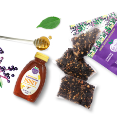 All Things Elderberry Elderberry Syrup DIY Kit with ingredients and bottles for making homemade elderberry syrup.