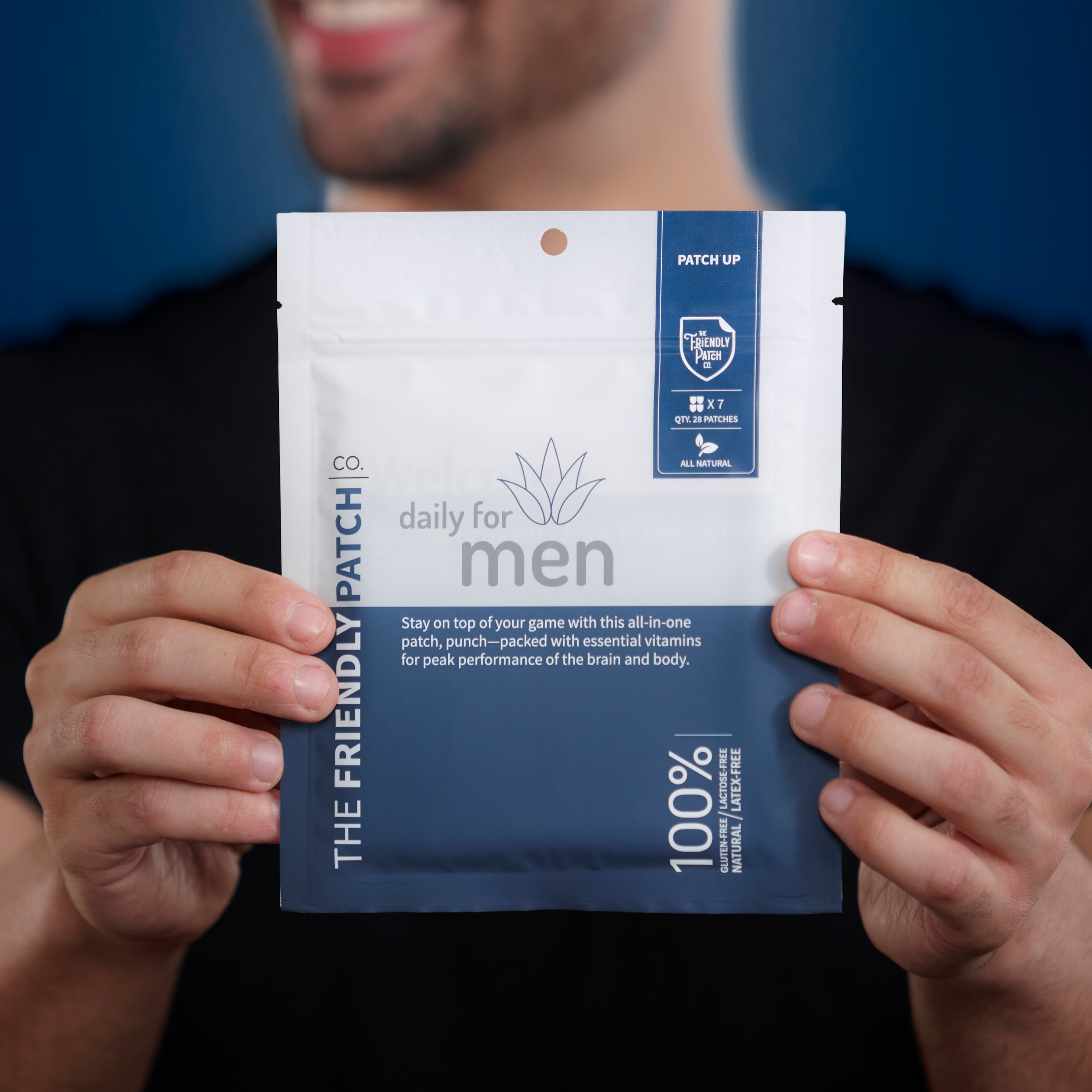 Close-up of Friendly Patch Co Transdermal Men's Vitamin Patches for daily B12 support, showing packaging and application area.
