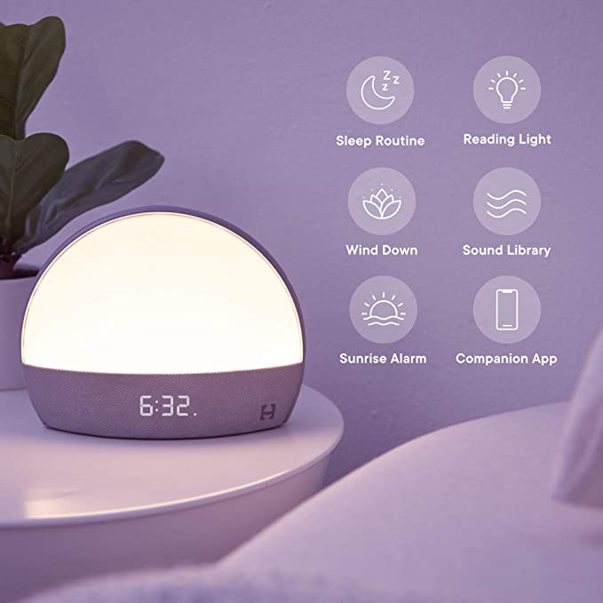 FLIPSTYLEZLLC Hatch Restore smart clock with white night light, baby monitor, and sleep sound features in white.