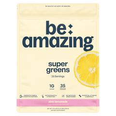 Be Amazing Super Greens powder in a jar, featuring vibrant green super greens blend for health and energy.
