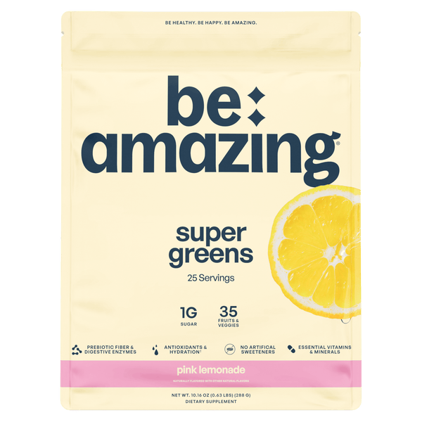 Be Amazing Super Greens powder in a jar, featuring vibrant green super greens blend for health and energy.