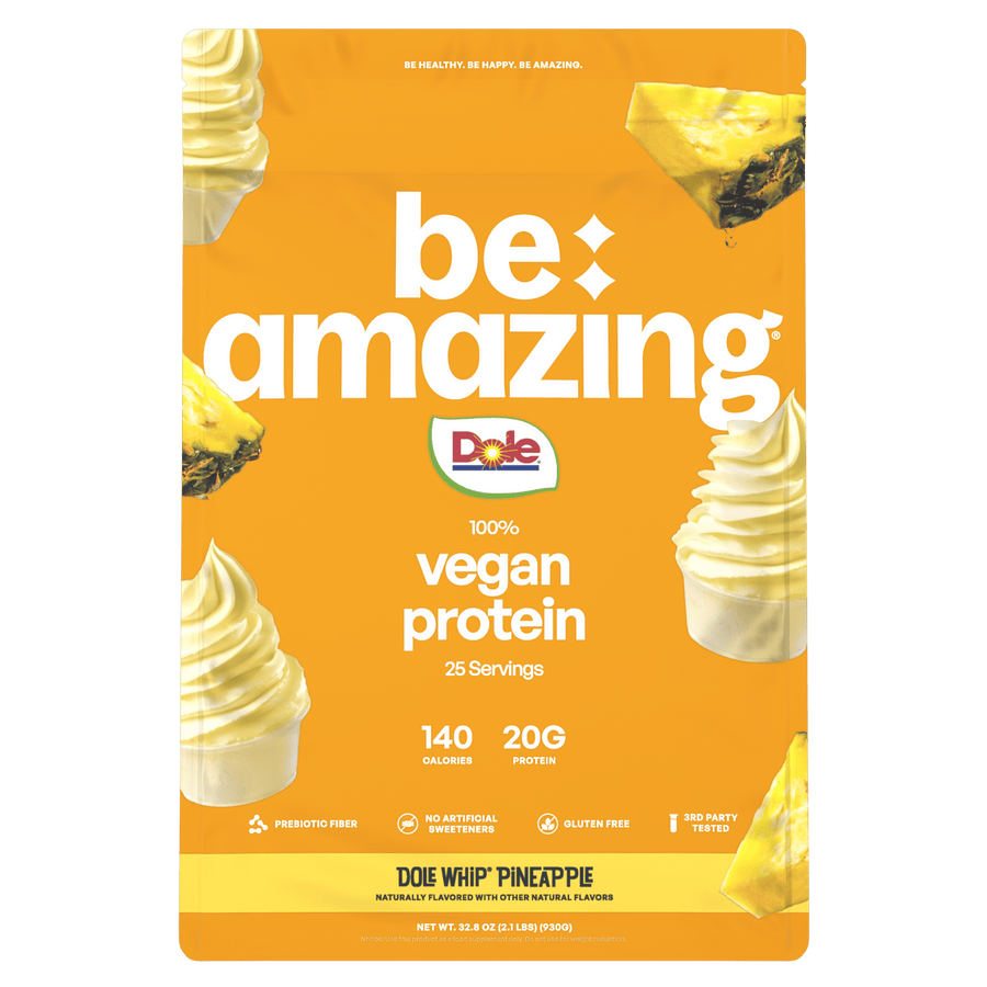Be Amazing vegan protein powder with Dole Whip Pineapple flavor, featuring 25 servings in a resealable container.