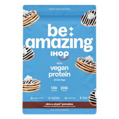 Be Amazing vegan protein powder with pineapple flavor, showing the container and serving scoop on a white background.