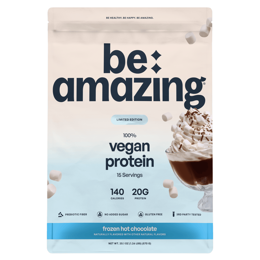 Be Amazing vegan protein powder with Dole Whip Pineapple flavor, 25 servings, displayed in a clear container with scoop