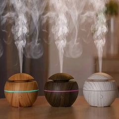 BioWizdom Tik Tok ultrasonic humidifier and aroma diffuser, marble design, emits mist for air moisture and aromatherapy.