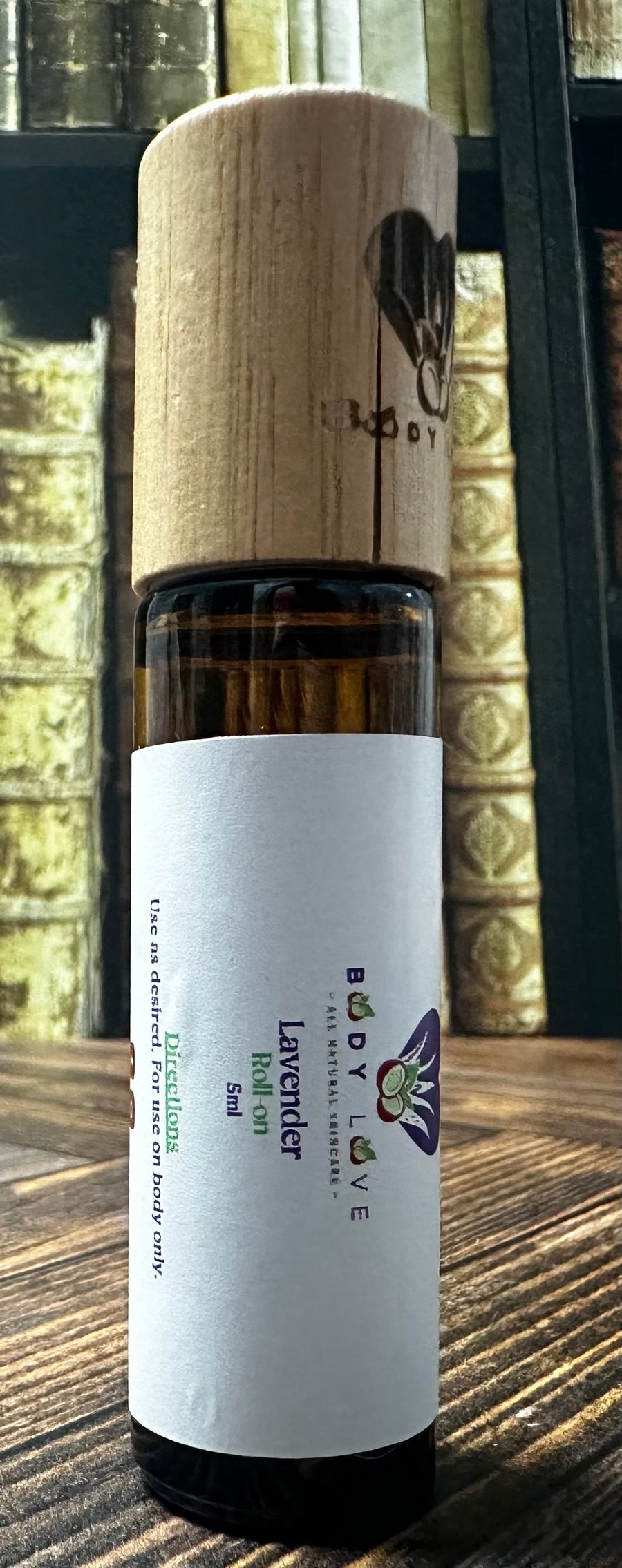 Body Love Self Care essential oil travel roll-ons from Bandit's Brew, compact diffuser oils for on-the-go aromatherapy.