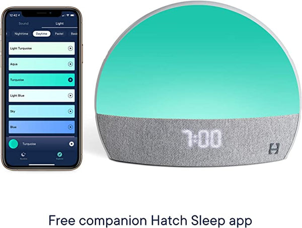 FLIPSTYLEZLLC Hatch Restore smart clock with small night light, baby monitor, white noise, and sleep sound features in white.