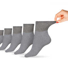 Pair of white women's cotton diabetic ankle socks by DSC, designed for shoe sizes 7-10, shown in a close-up image.