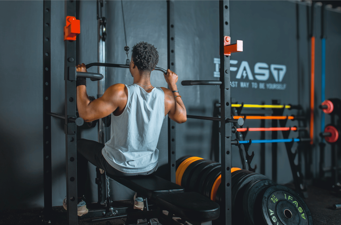 Berry Charmz multi-functional power cage with adjustable pull-up bar and squat rack, supporting up to 1000 lbs for home fitness.