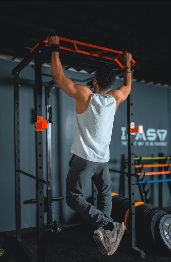 Berry Charmz multi-functional power cage with adjustable pull-up bar and squat rack, supporting up to 1000 lbs for comprehensive home fitness.