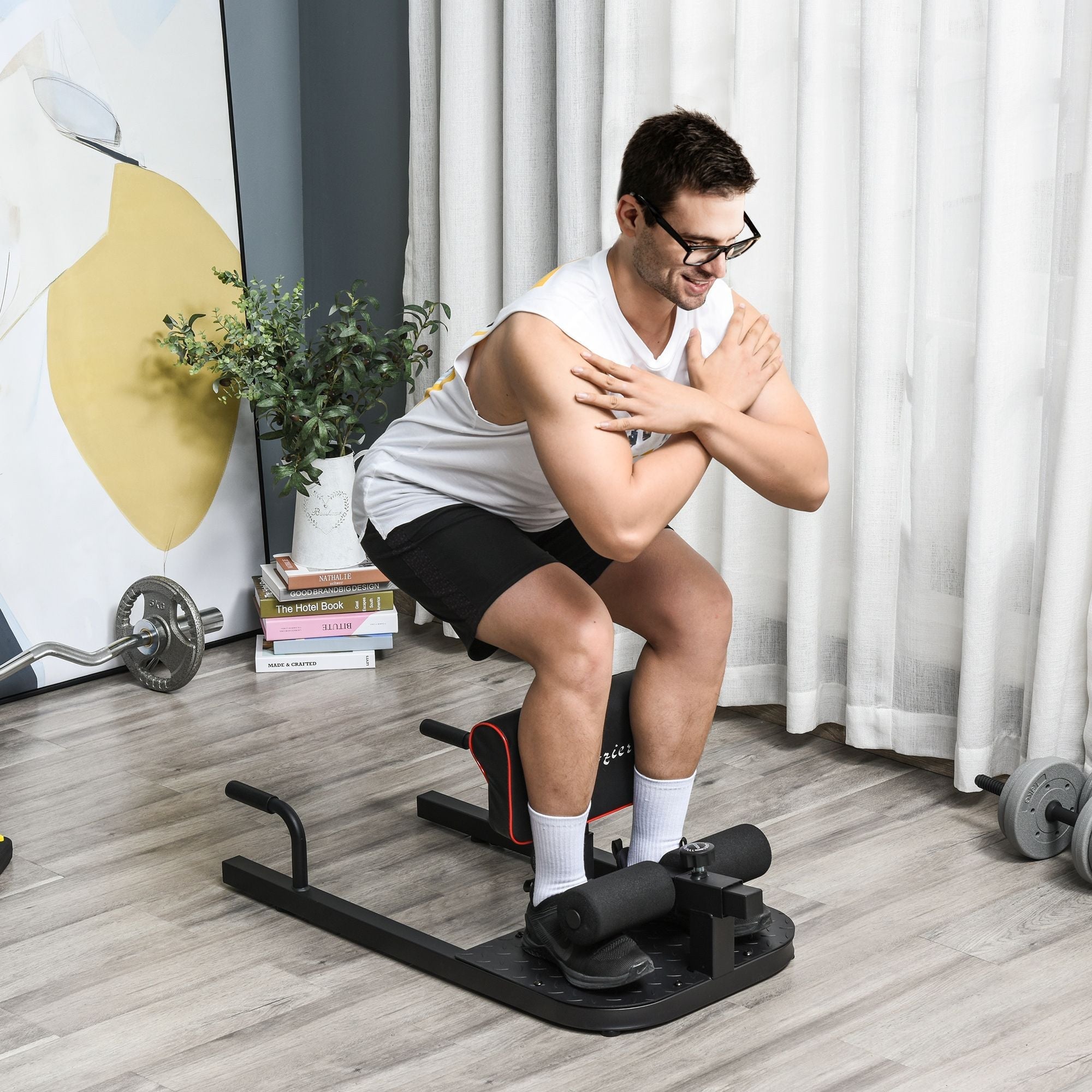 Black 3 in 1 padded push-up, sit-up, and squat machine from Berry Charmz for home gym fitness workouts.