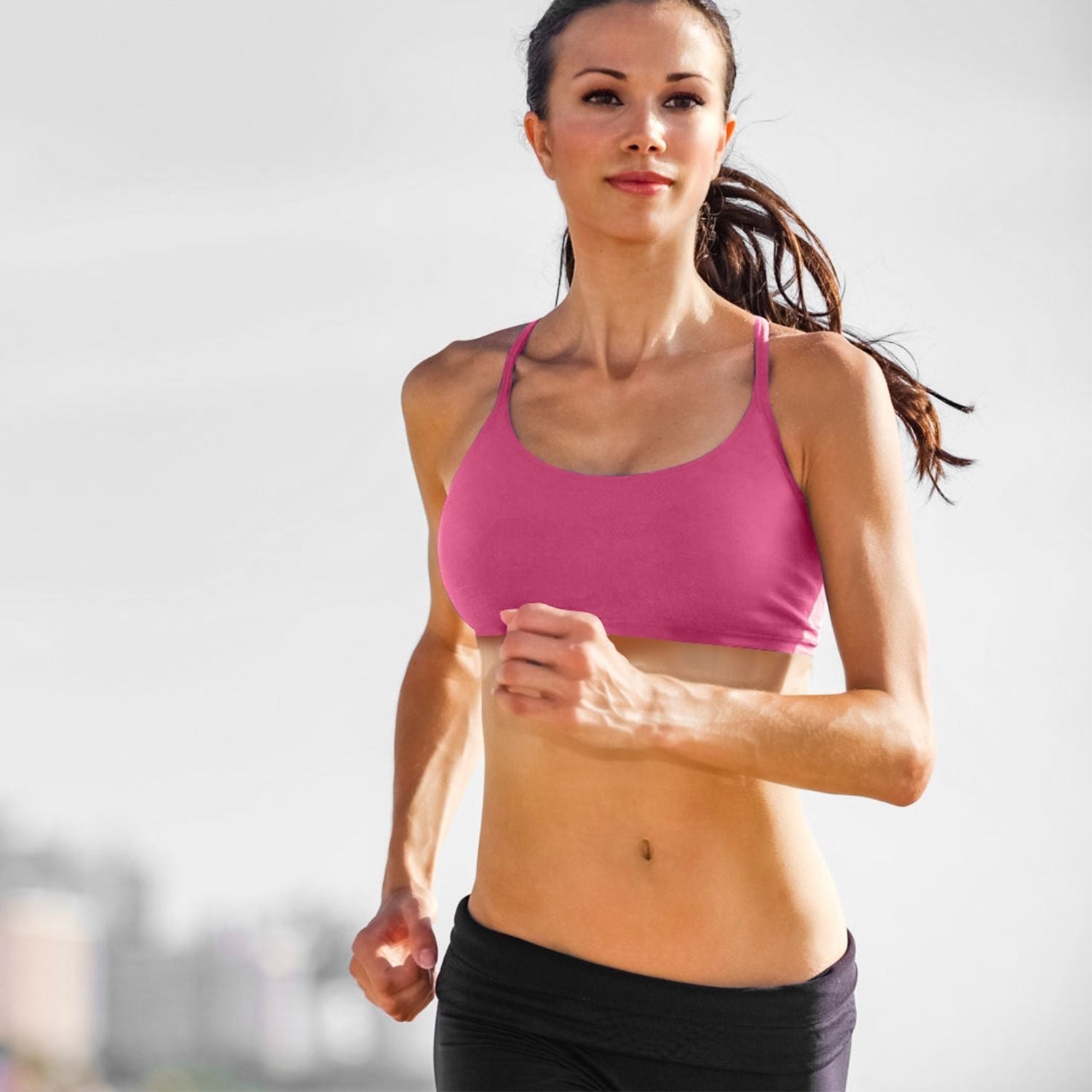 Berry Charmz women's strap sport bras with padded, strappy design, square neck, and low-impact fit shown in a stylish fitness tank top.