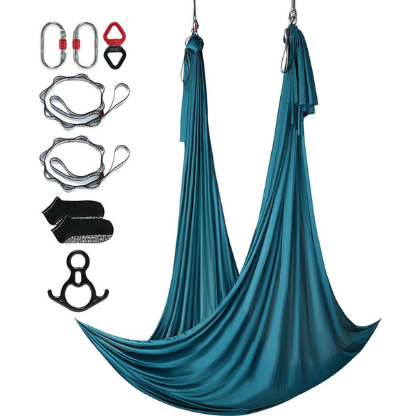 Berry Charmz aerial silk and yoga swing in green, 11 yards nylon fabric with rigging hardware, set up for aerial yoga and fitness.