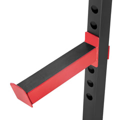 Berry Charmz Power Cage Power Rack with adjustable height, J-hooks, and attachments for squat, bench press, pull-ups, and dips.
