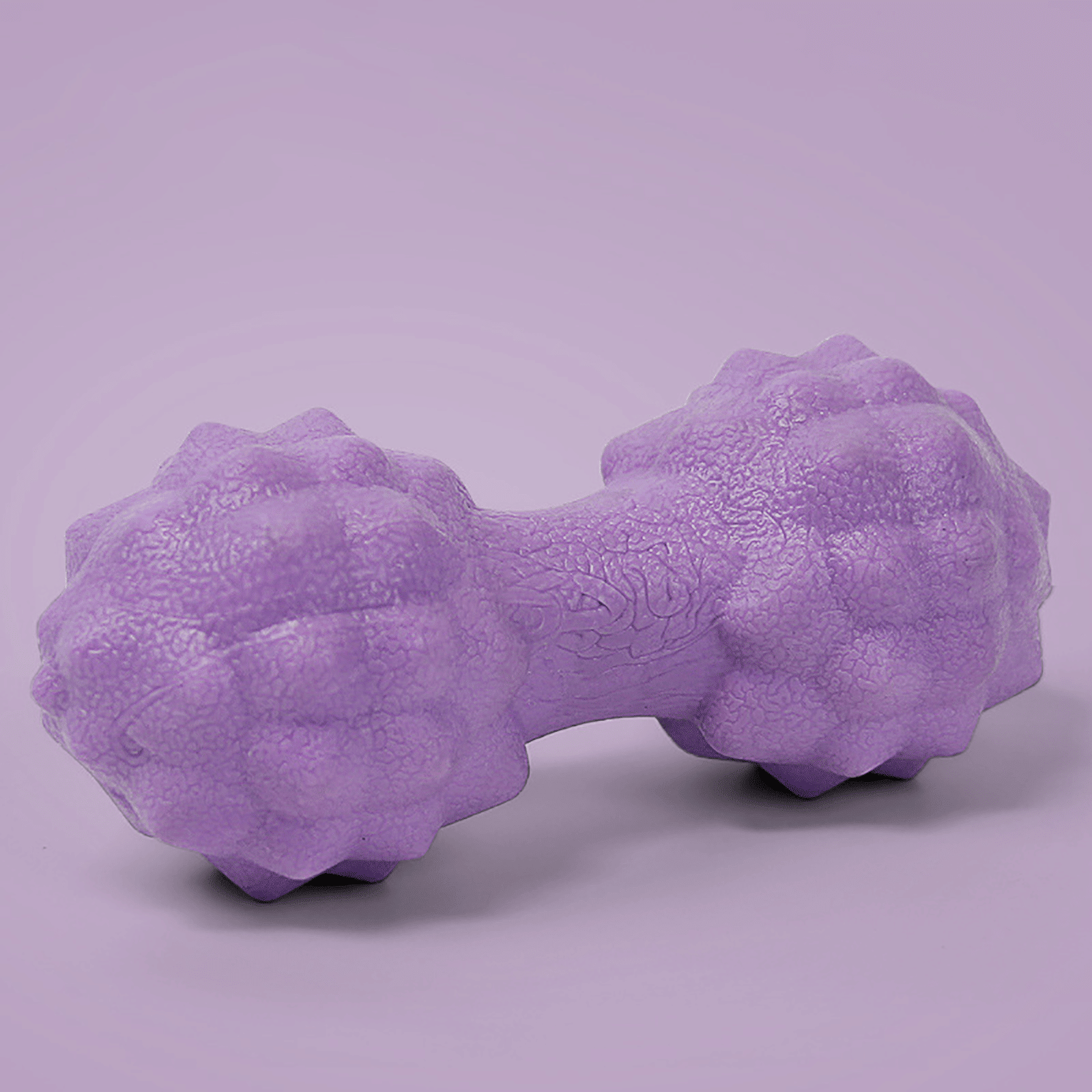 Berry Charmz massage ball for muscle relaxation and fascia release, used for fitness, pain relief, and yoga exercises.