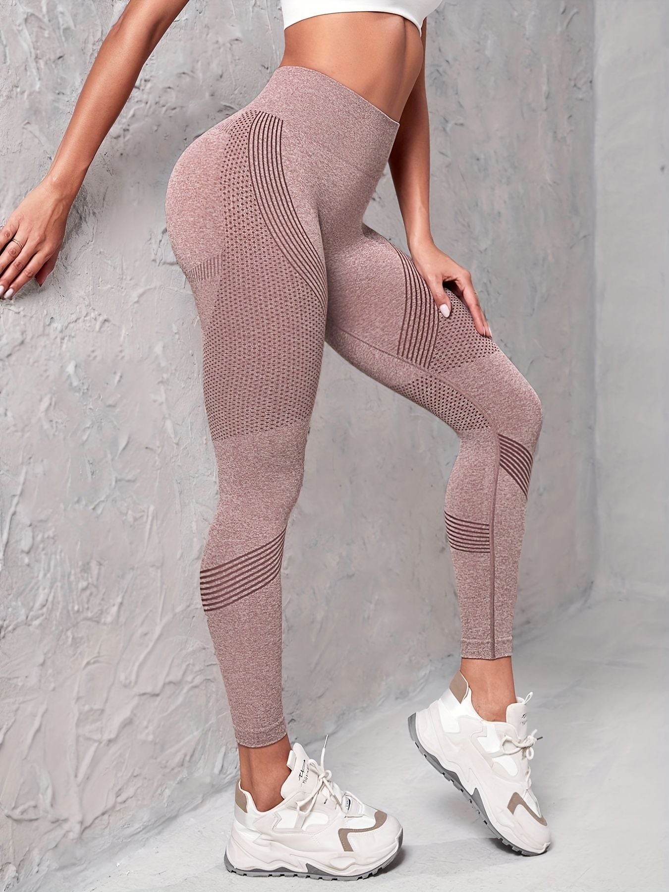 Set of three seamless striped yoga leggings for women by Berry Charmz, high stretch slim fit activewear for workout and gym activities.