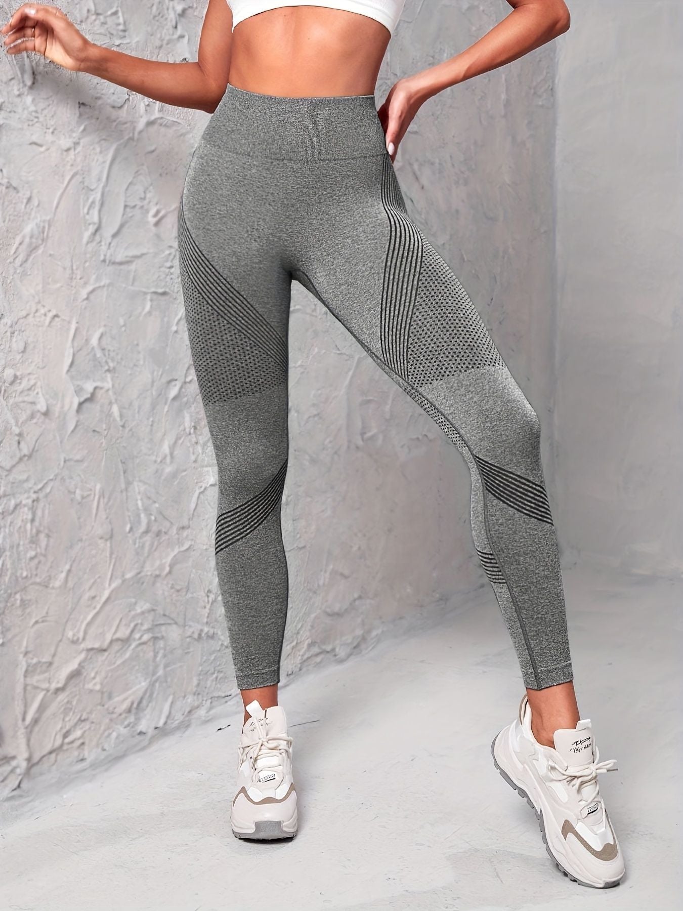 Set of three seamless striped yoga leggings for women by Berry Charmz, high stretch slim fit activewear for gym and workouts.