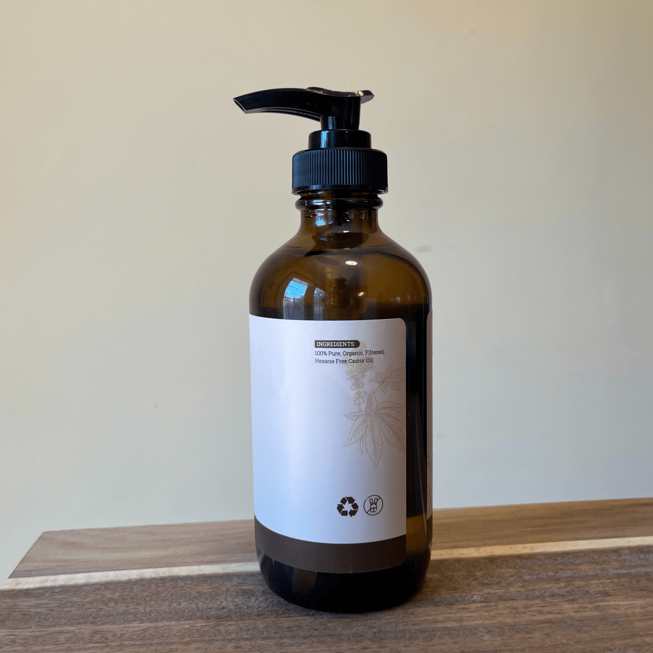 Organic hexane-free castor oil from Elemental Wellness Shop, cold-pressed therapeutic grade for hair, skin, lashes, and castor oil packs.