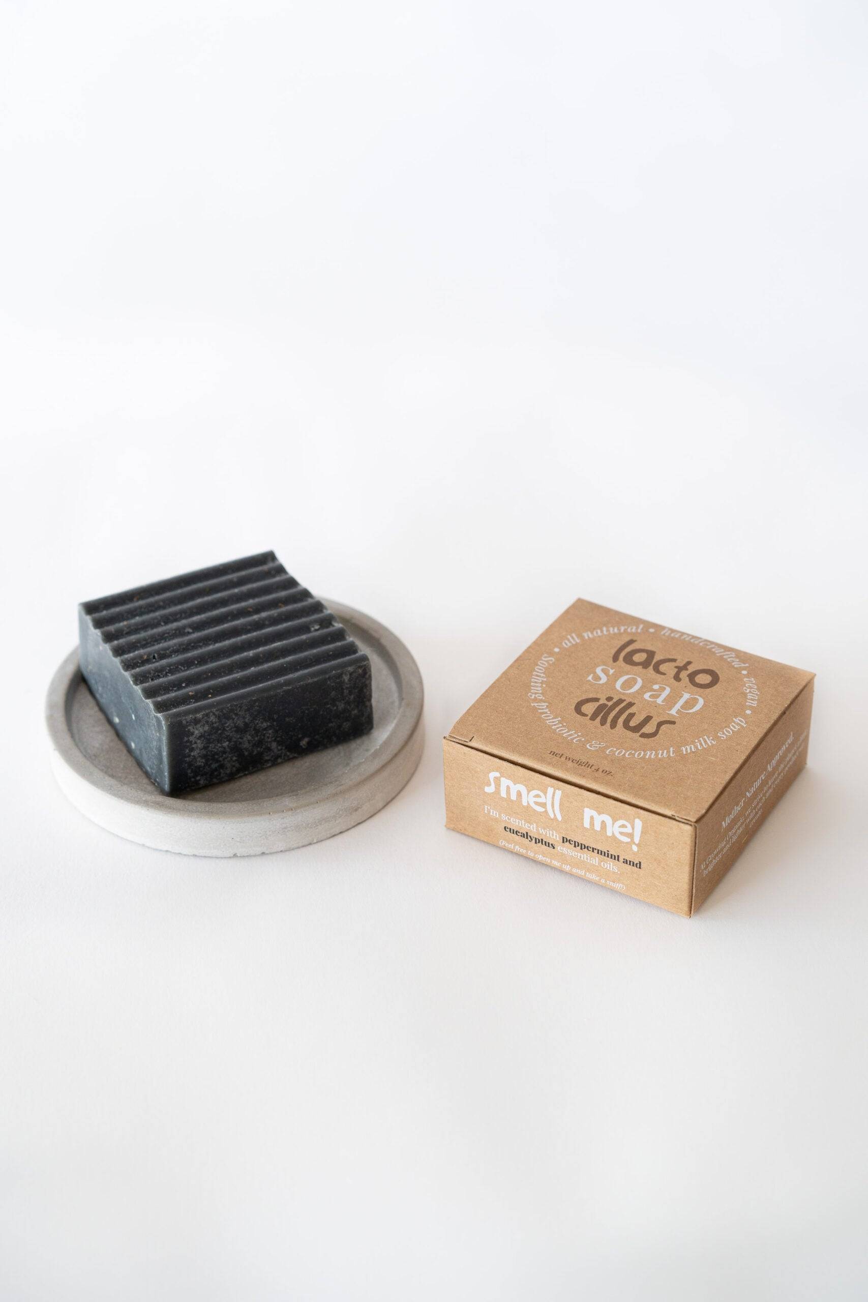 Probiotic Bar Soap with frankincense, tea tree, and lavender from Elemental Wellness Shop, showing the soap's natural ingredients and texture.