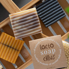 Probiotic bar soap with frankincense, tea tree, and lavender from Elemental Wellness Shop, showing the soap with botanical ingredients.