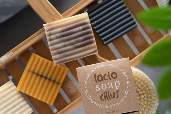 Probiotic bar soap with frankincense, tea tree, and lavender from Elemental Wellness Shop, showing the soap with botanical ingredients.