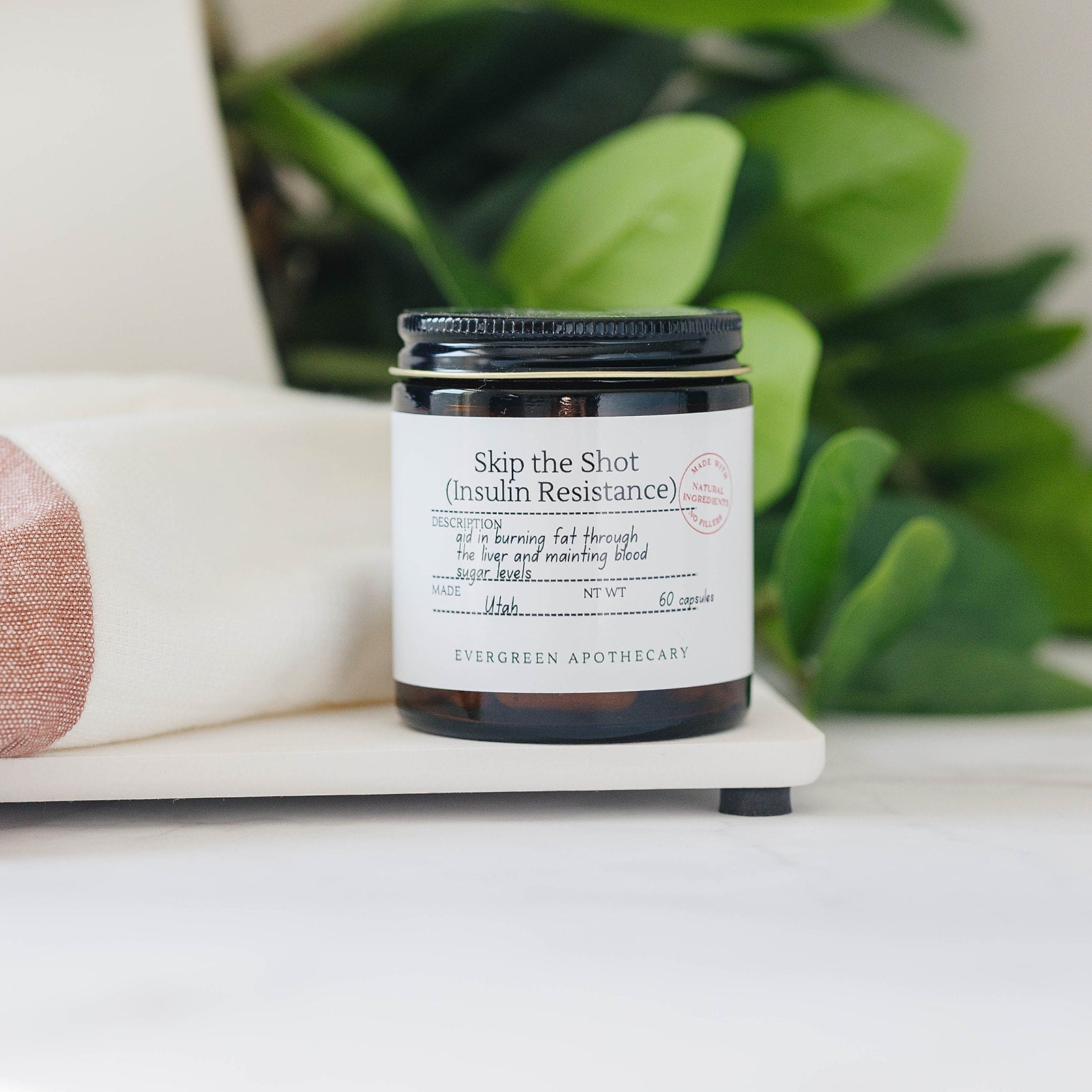 Evergreen Apothecary Botanical Wellness Capsules featuring herbal blend formula in a clear capsule, natural herbal supplement.