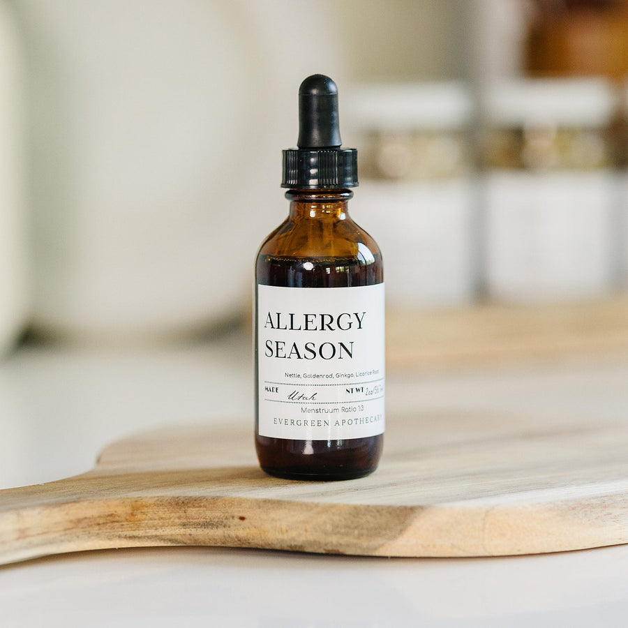 Evergreen Apothecary Allergy Season tincture bottle with label, natural remedy for allergy relief, in a clean setting.