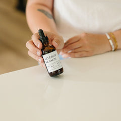 Evergreen Apothecary Allergy Season tincture bottle with label, herbal remedy for allergy relief, natural health supplement.