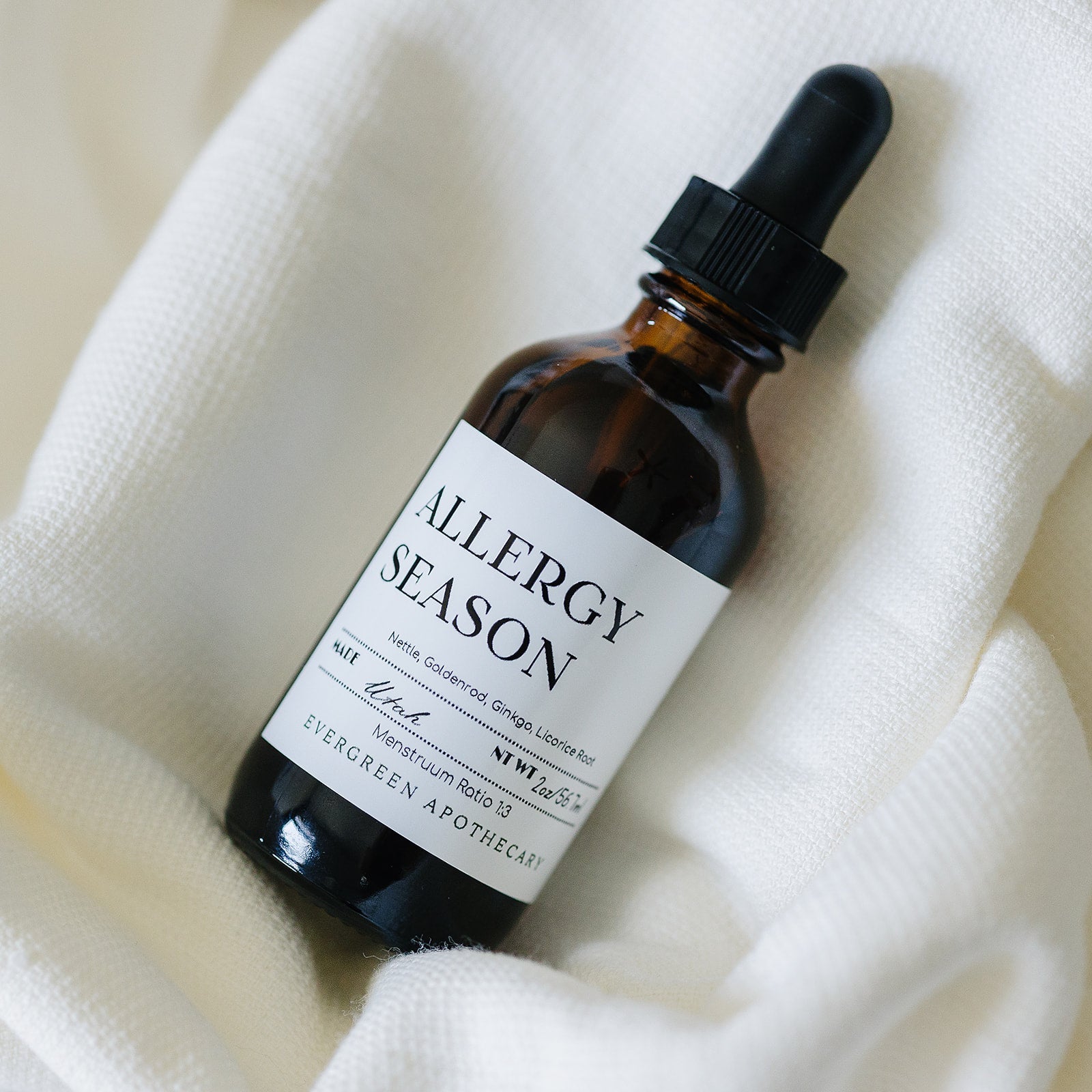 Evergreen Apothecary Allergy Season tincture bottle with label, natural remedy for allergy relief displayed in the image.