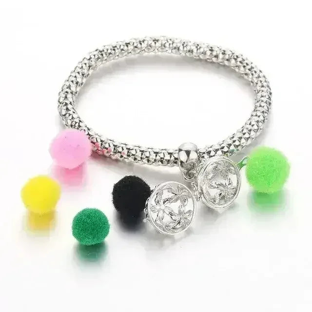 Femstylo aromatherapy bracelet with locket for essential oils, stylish jewelry piece with adjustable band and decorative design.