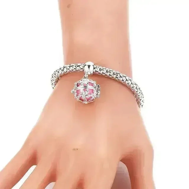 Femstylo aromatherapy bracelet with locket for essential oils, stylish jewelry piece with adjustable band and decorative design.