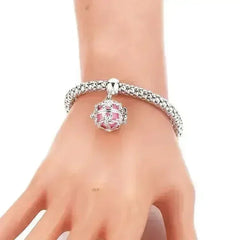Femstylo aromatherapy bracelet with locket for essential oils, stylish jewelry piece with adjustable band and decorative design.