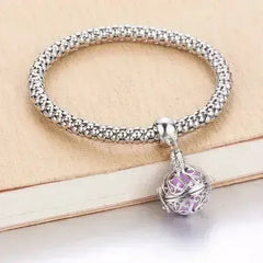 Femstylo aromatherapy bracelet with locket for essential oils, stylish jewelry piece with scent diffusion feature.
