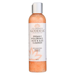 Organic Hydrating Facial Cleanser with Jojoba Beads by Glimmer Goddess Organic Skin Care in 8 oz bottle, showing the cleanser's creamy texture.