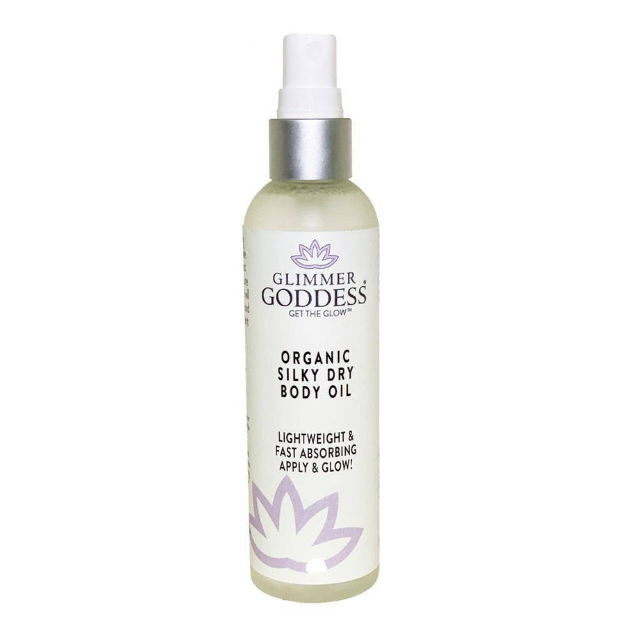Organic Silky Dry Body Oil by Glimmer Goddess, a fast-absorbing lotion with a smooth, lightweight texture for skin nourishment.