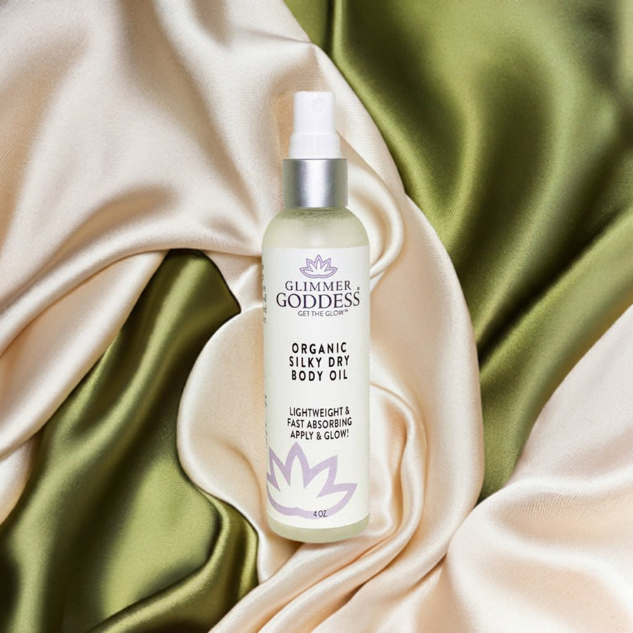 Organic Silky Dry Body Oil by Glimmer Goddess® Organic Skin Care, featuring a luxurious, fast-absorbing body oil in a sleek bottle.