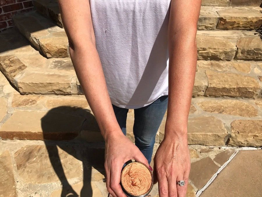 Organic Whipped Bronzing Body Butter by Glimmer Goddess® moisturizing lotion with shimmering bronze glow and subtle instant bronze tint.
