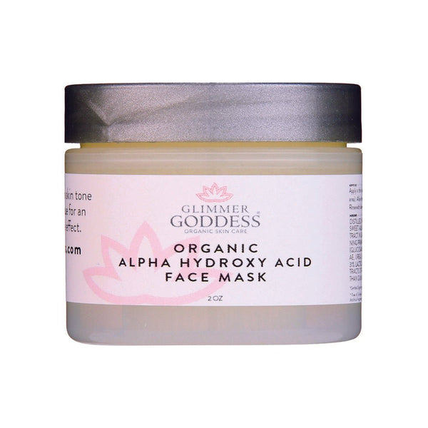 Glimmer Goddess Organic AHA Face Mask for exfoliation and glowing skin, in a jar with a smooth, creamy texture.