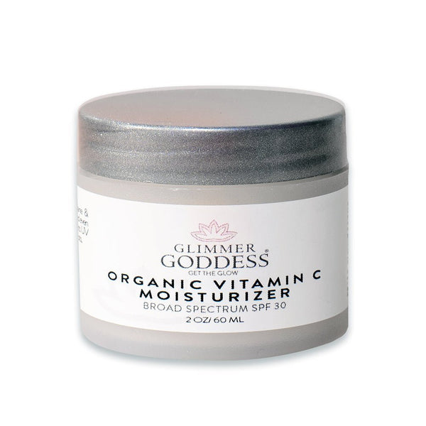 Glimmer Goddess Organic Vitamin C Daily Moisturizer SPF 30 in a 2 oz jar, brightening and hydrating skin with natural ingredients.