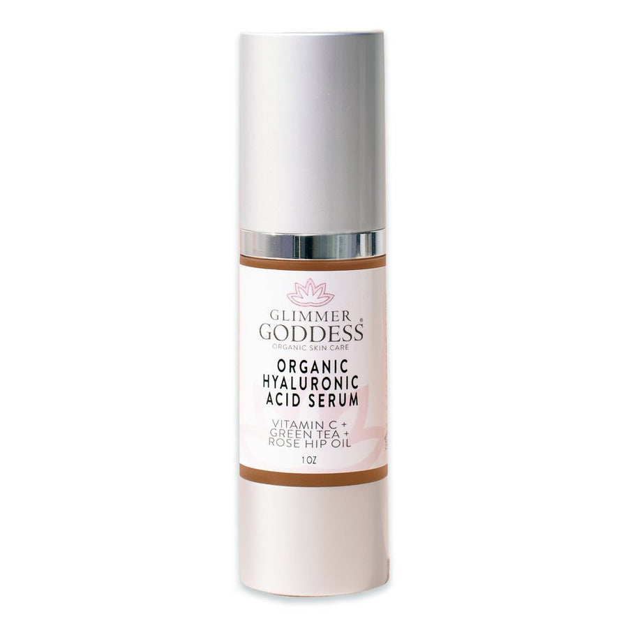 Glimmer Goddess Organic Hyaluronic Acid Serum in 1 oz bottle, providing plumping hydration for healthy skin.