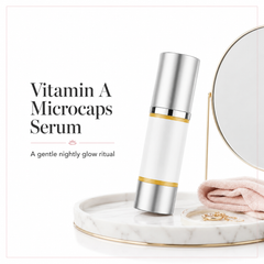 Glimmer Goddess Organic Skin Care Vitamin A Microcaps Serum in a glass dropper bottle, showing the serum's smooth texture.